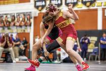 Pahrump Valley High School freshman Patience Moore duels against Las Vegas High School’s Arma ...