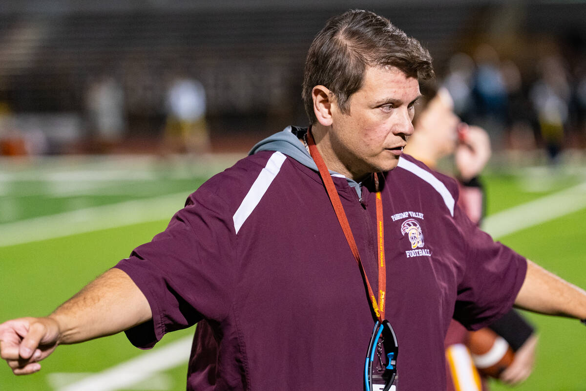 Pahrump Valley High School flag football assistant head coach Edward Rankin tries to instruct t ...