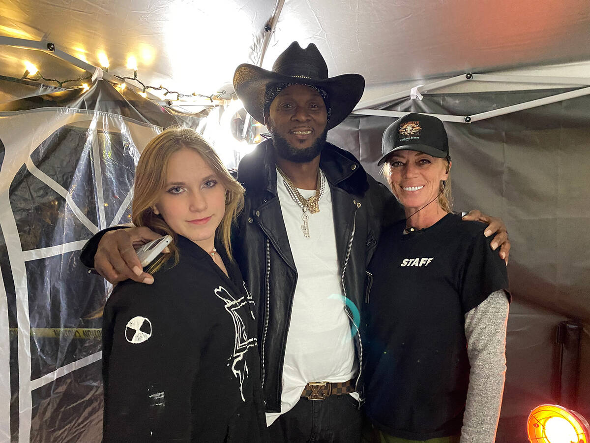 Pahrump teen Avery Sampson, left, poses with Nashville musician Wild Bill Young, center, and Dr ...