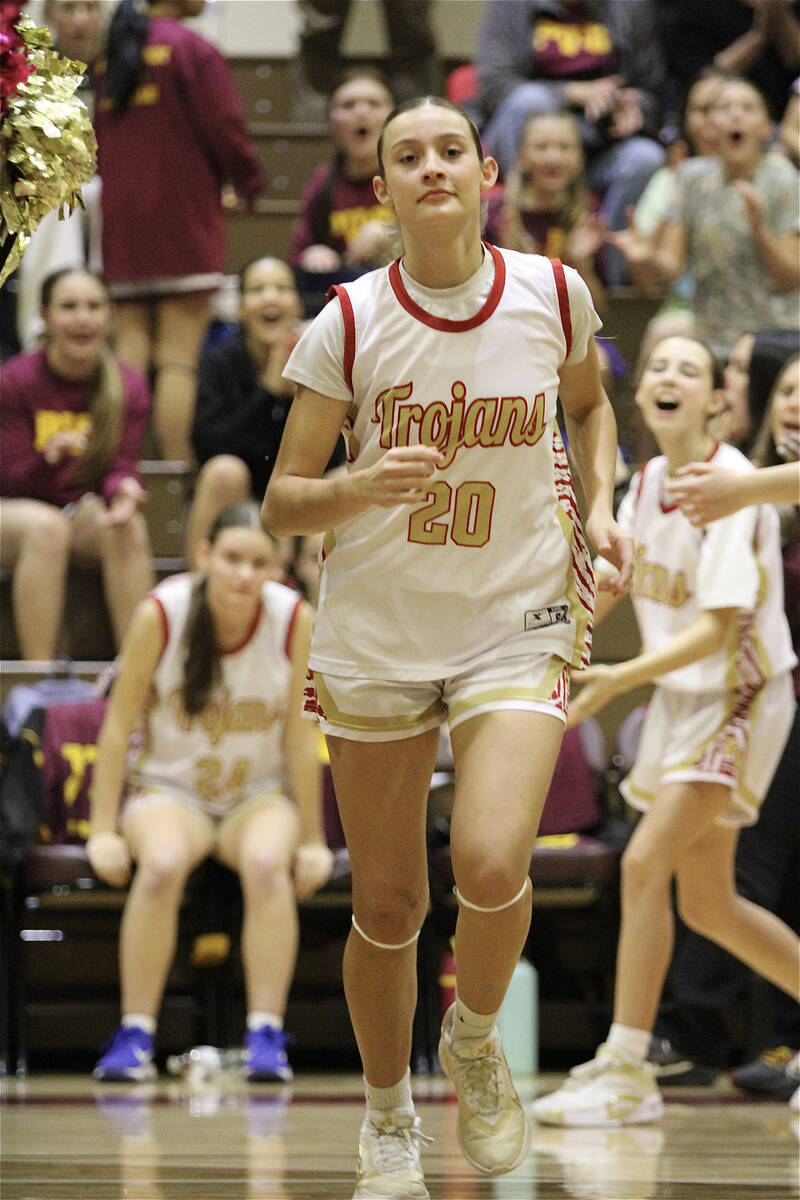 Trojans junior Riley Saldana jogs out during the announcement of the starting lineup prior to t ...