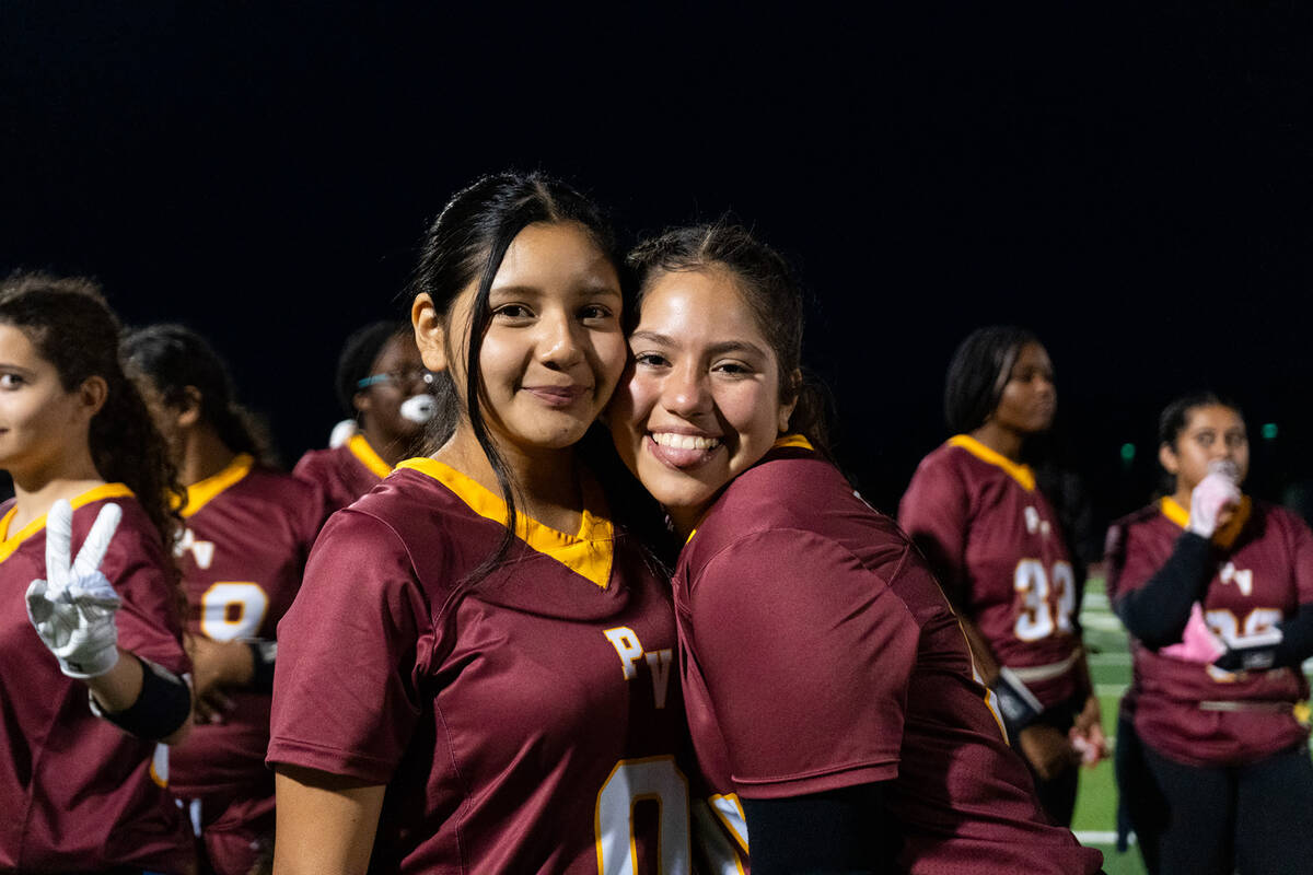 PVHS flag football teammates Jazmyn Herrera and Sariyah Villeda-Swidan share a quick moment tog ...
