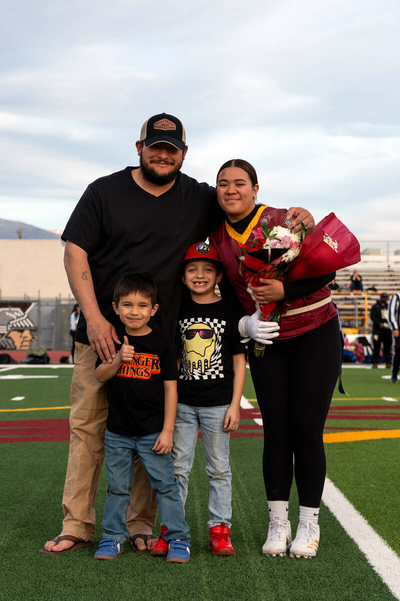 PVHS senior Leah-Marie Cooper is honored with her family prior to kickoff against Amplus Academ ...