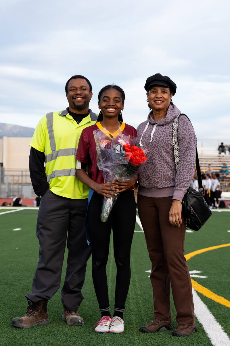 PVHS senior Diona Nixon is honored with her family prior to kickoff against Amplus Academy on F ...