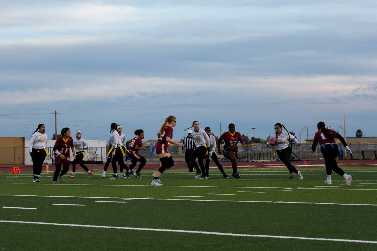 The Trojans defense tries to come up with a stop during the program's final game of the regular ...
