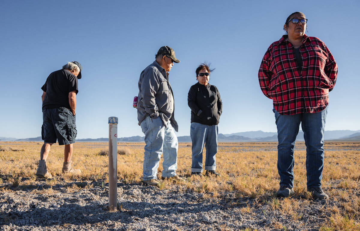 Timbisha Shoshone Tribe elders and Mandi Campbell stand near where underground water levels are ...