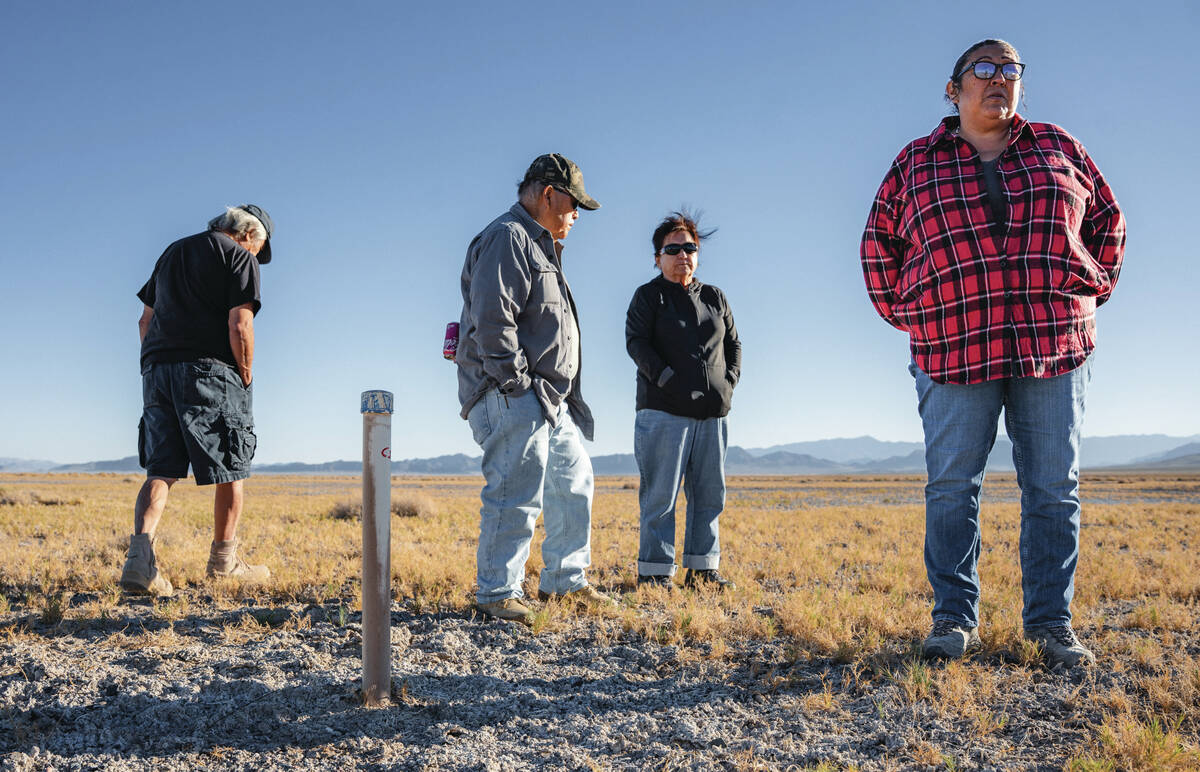 Timbisha Shoshone Tribe elders and Mandi Campbell stand near where underground water levels are ...