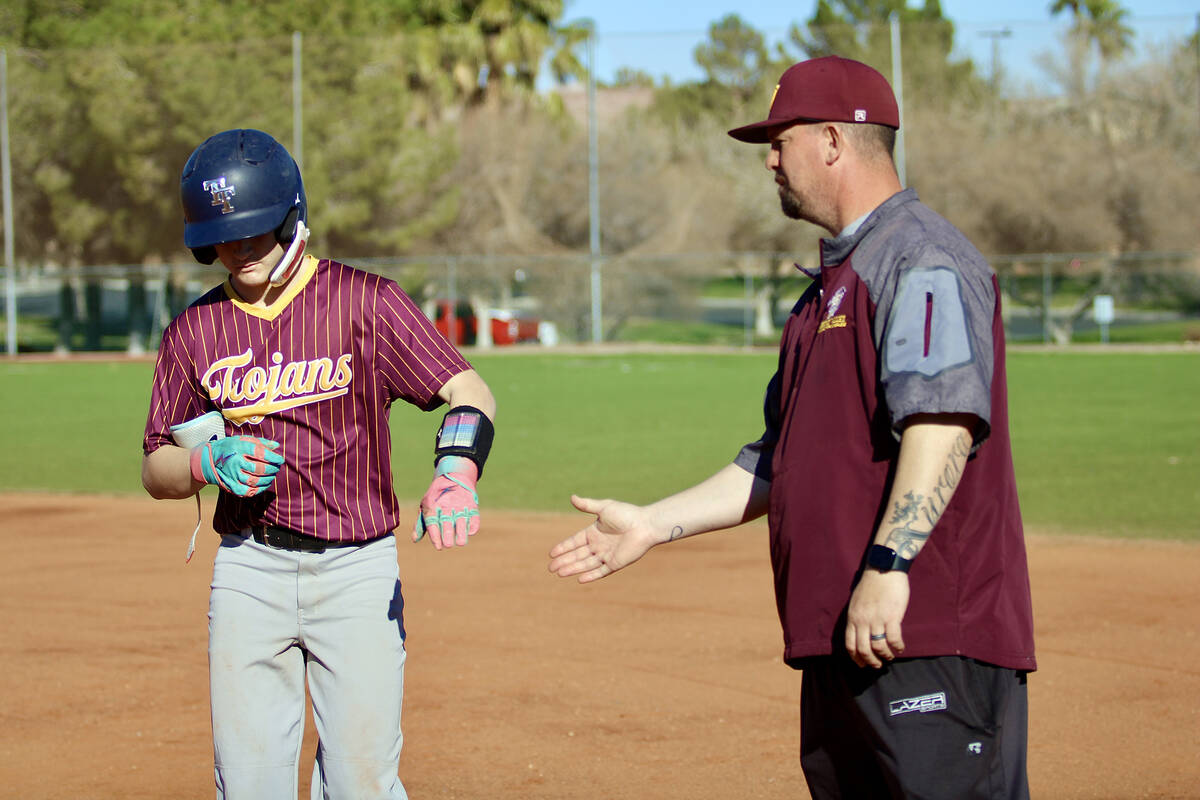 Pahrump Valley High School sophomore Anthony Montanez is greeted by his pops, Raymond Montanez, ...