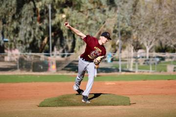 Pahrump Valley High School junior Samuel Mendoza hurls a strong inning for the Aztecs during th ...