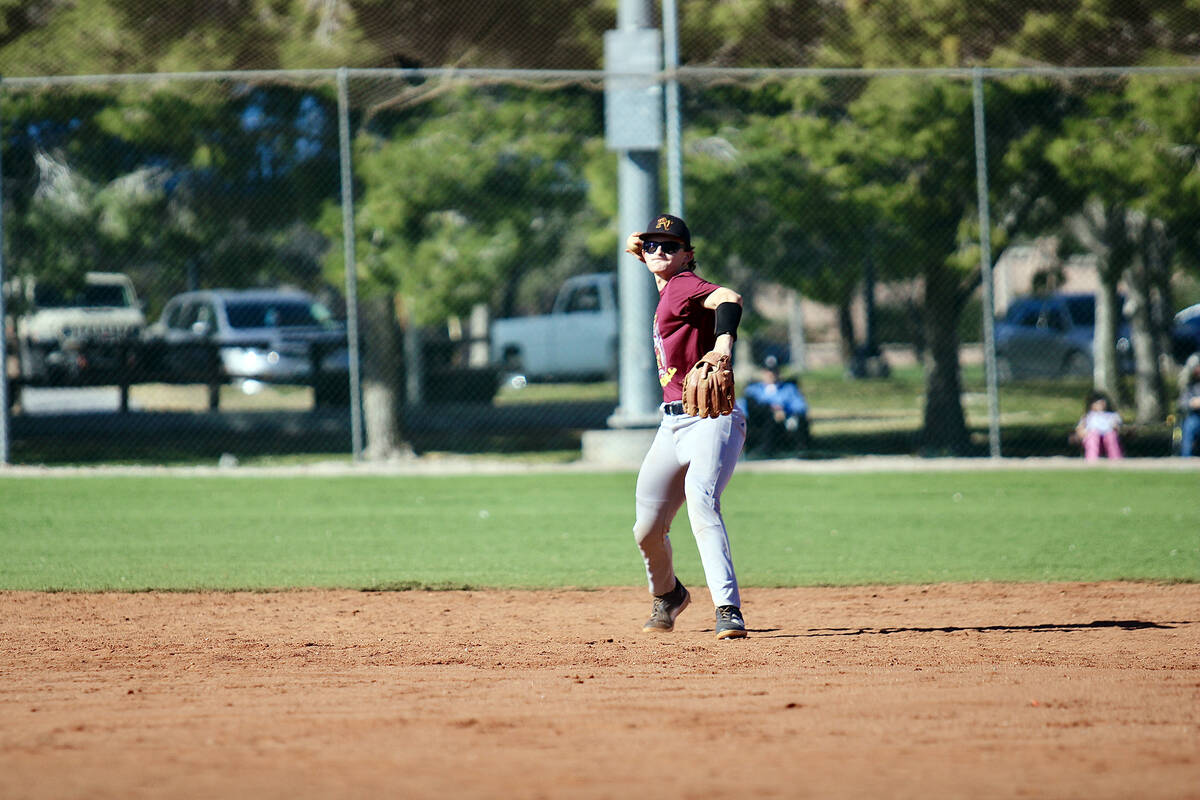 Pahrump Valley High School senior Benjamin Cimperman cleanly fields a ground ball at shortstop ...