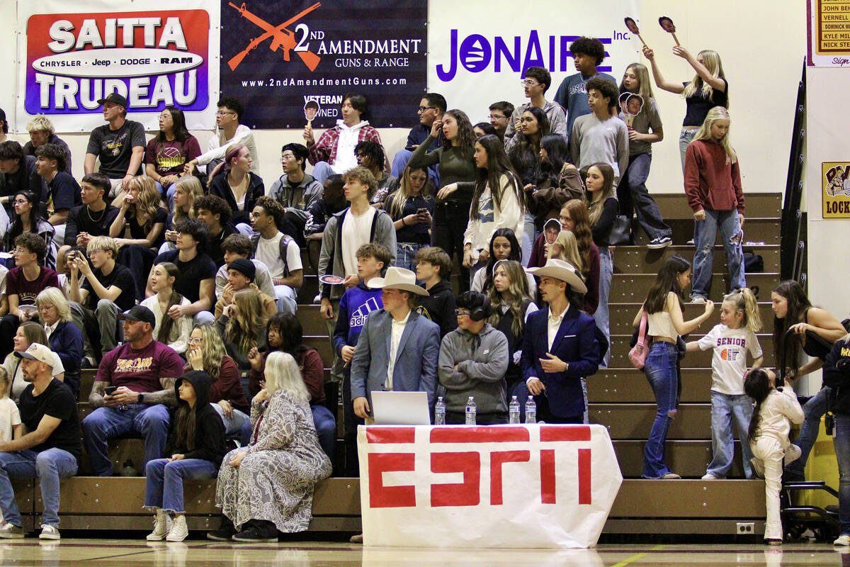 The home student section proudly displays their "ESPN" theme for Senior Night against the Eagle ...
