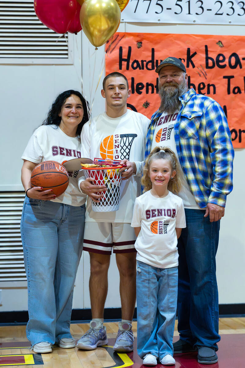 Pahrump Valley High School senior Joshua Slusher is honored pregame for his dedication and comm ...