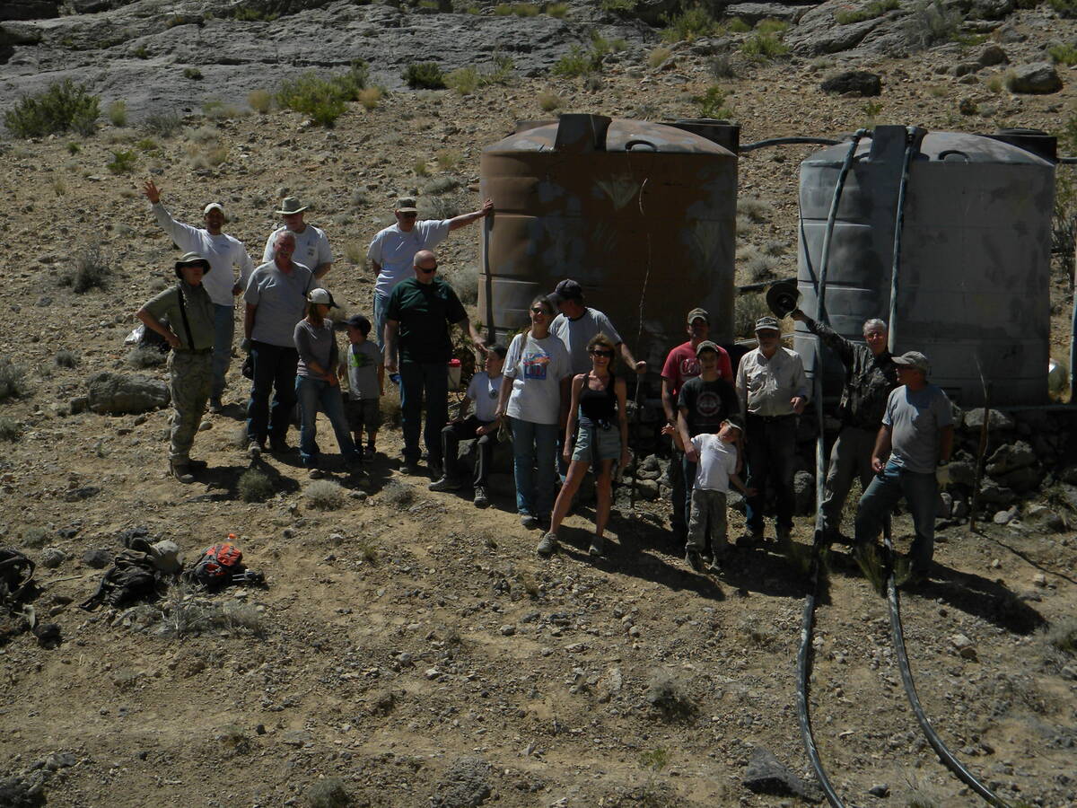 The guzzlers consist of a natural rock, or artificial sheet, to collect rainwater and focus its ...