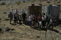 The guzzlers consist of a natural rock, or artificial sheet, to collect rainwater and focus its ...