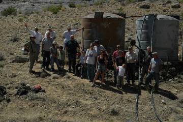 The guzzlers consist of a natural rock, or artificial sheet, to collect rainwater and focus its ...