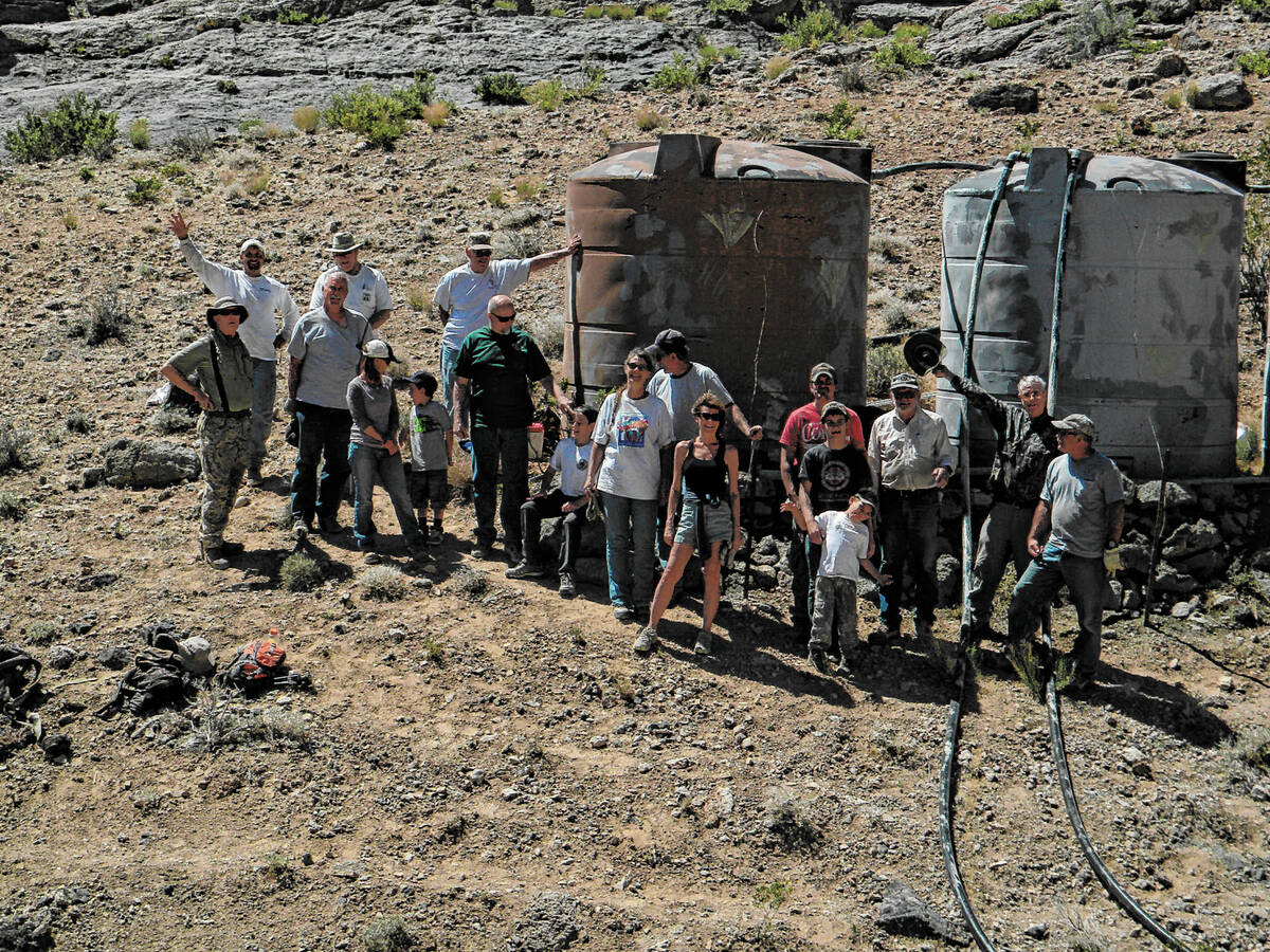 The guzzlers consist of a natural rock, or artificial sheet, to collect rainwater and focus its ...