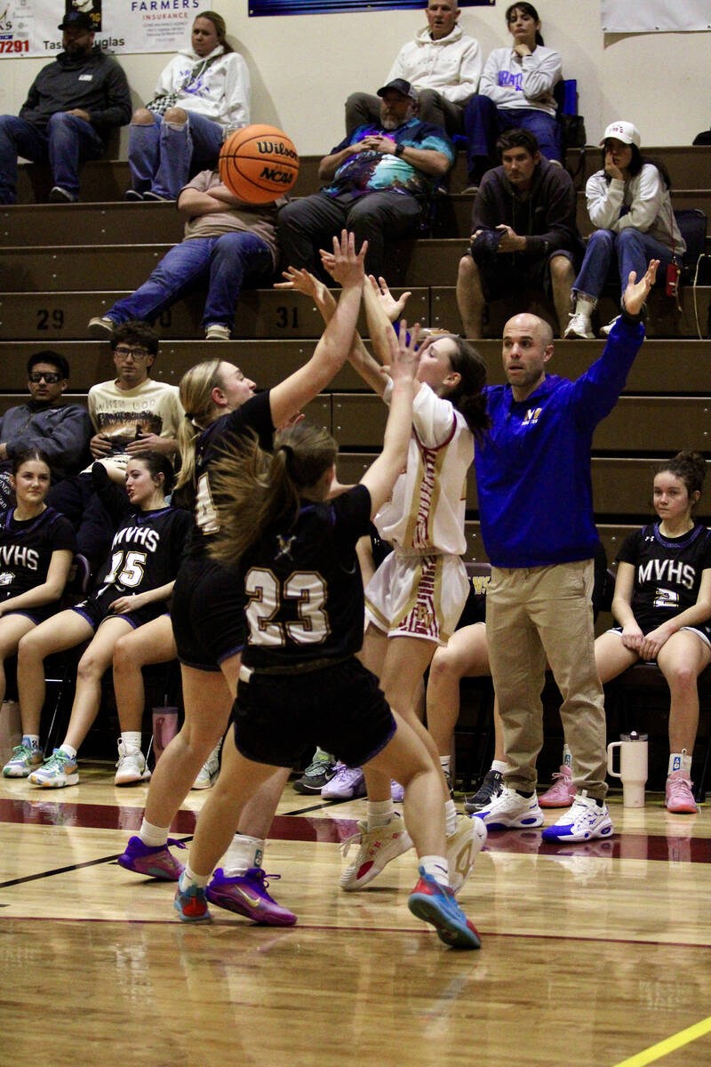 PVHS sophomore Addi Nelsen does her best to escape double coverage during a full-court press st ...