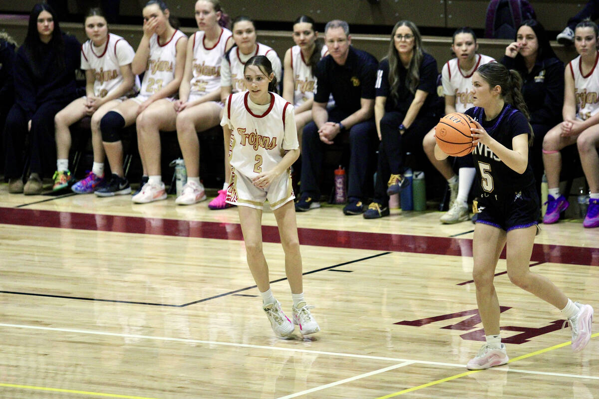Pahrump Valley High School sophomore Addi Nelsen looks to transition on defense while guarding ...