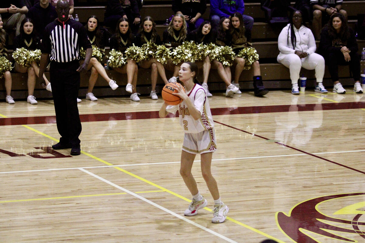 PVHS sophomore Addi Nelsen pulls up from deep during the Trojans first round of the Class 3A re ...