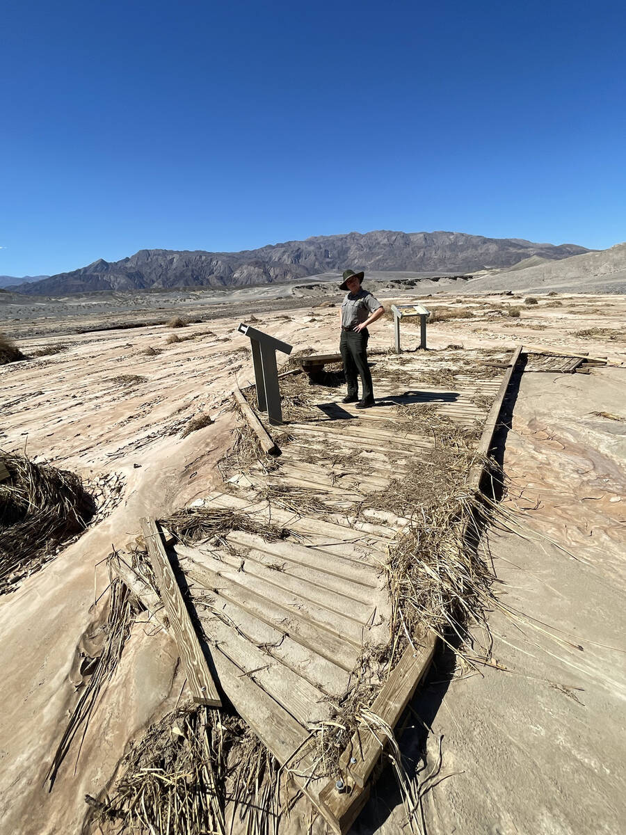 A park ranger stands on a section of the old Salt Creek boardwalk. In 2022, a flash flood trans ...