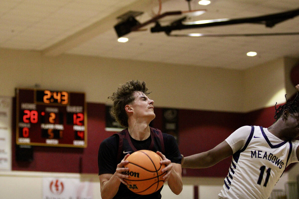 PVHS senior Keir Sheppard braces himself to drive into the hole during the Class 3A regionals s ...
