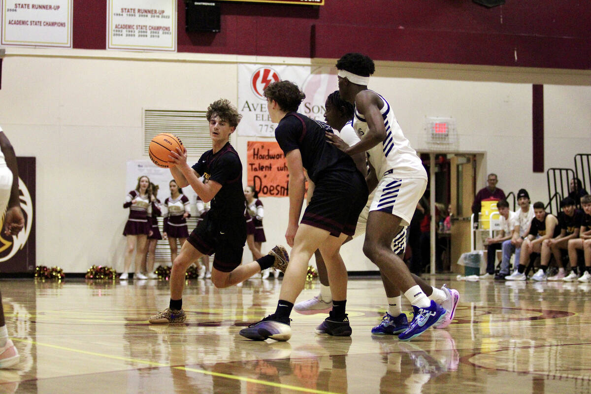 PVHS junior Lucas Gavenda swings the ball to Keir Sheppard during the during the Class 3A regio ...