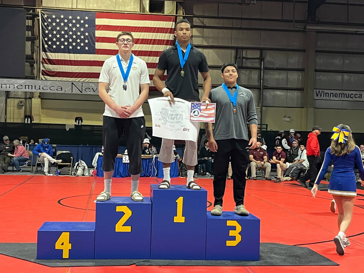 Pahrump Valley High School junior Iyan Bosket stands tall on first place podium at the NIAA 3A ...