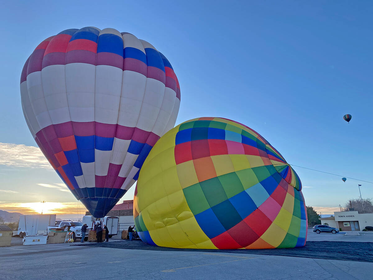 As the sun peaked over the mountains the morning of Friday, Feb. 13, the Hot Air Rally in the V ...