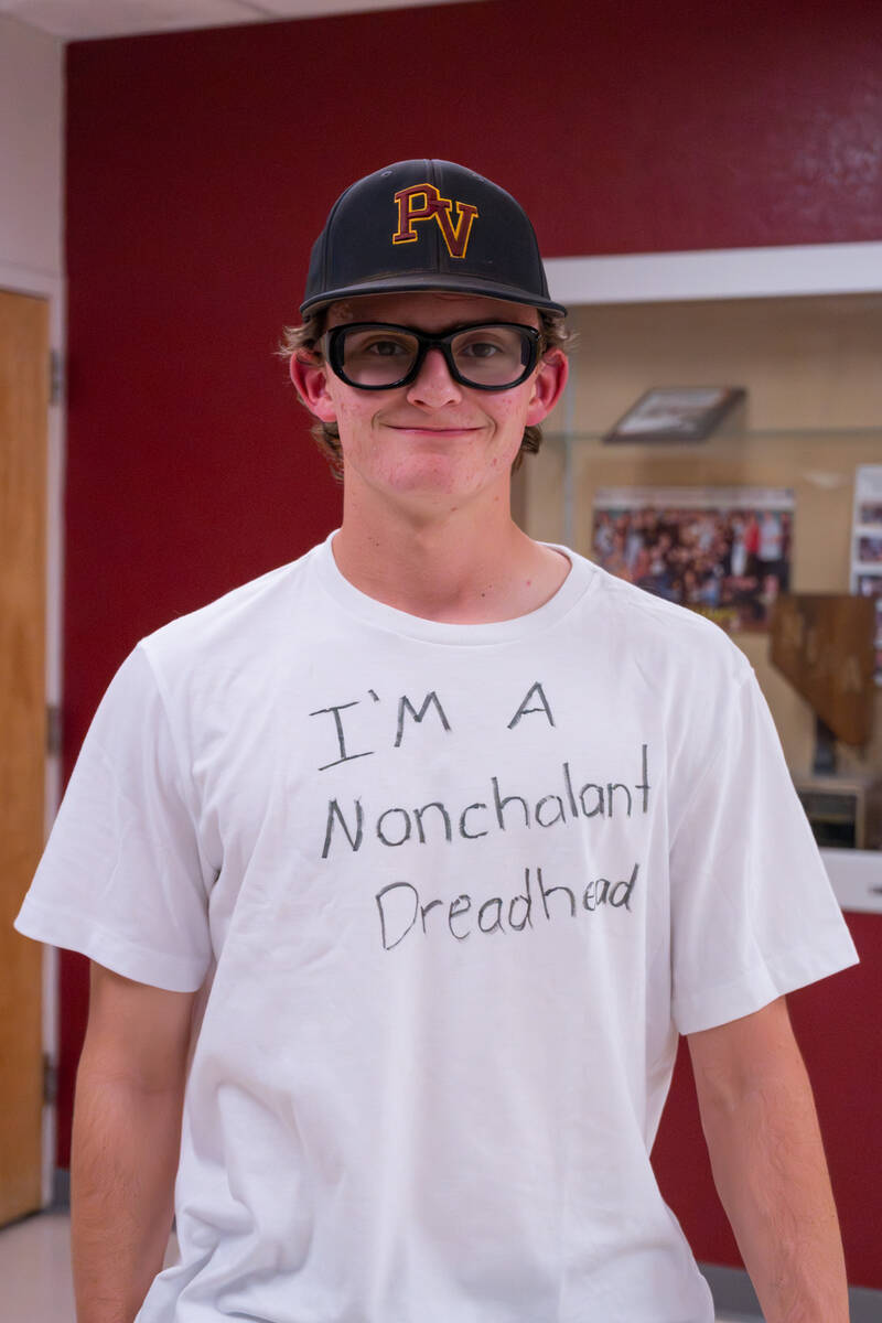 Pahrump Valley High School senior Benjamin Cimperman grins while wearing his comedic "I'm a Non ...