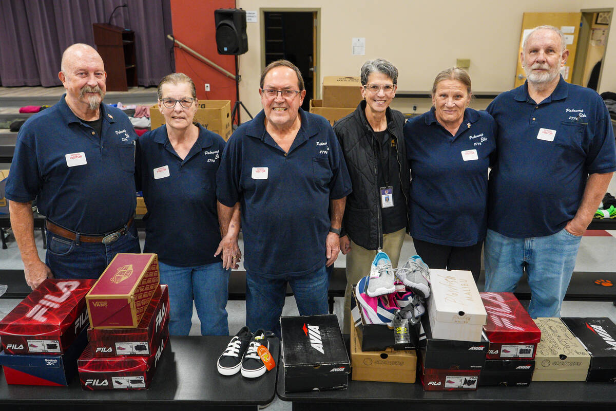 Helping with the delivery and shoe fitting at Floyd Elementary School this month were Pahrump E ...