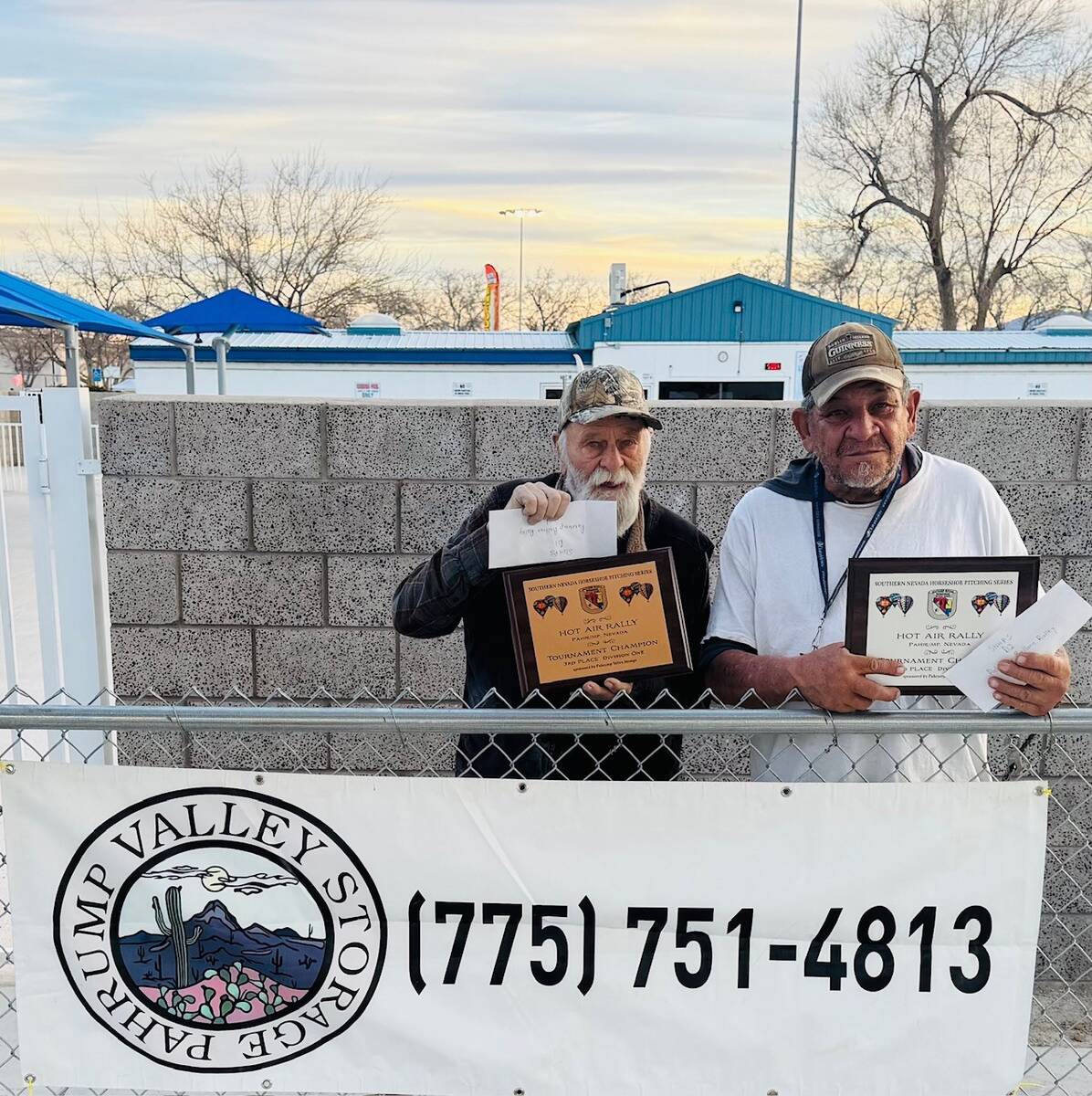 Southern Nevada Horseshoe Pitching Series pitchers Lawrence Workman (left) and his pitching par ...