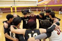 The Pahrump Valley High School Jv volleyball team huddles together before their first exhibitio ...