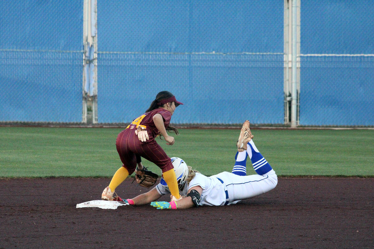 Pahrump Valley High School freshman shortstop Aspen Middaugh makes the tag at second base on a ...