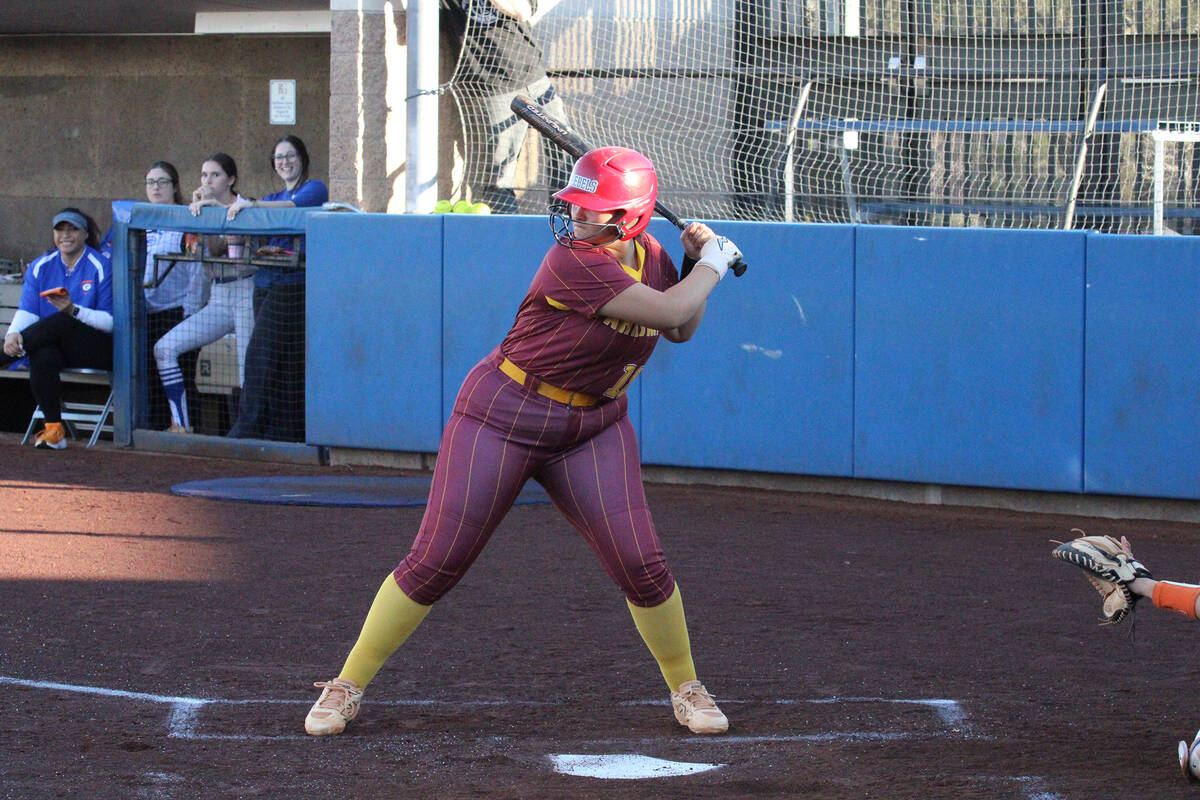 Pahrump Valley High School junior Evalenne Armendariz prepares to smack a ball to centerfield i ...