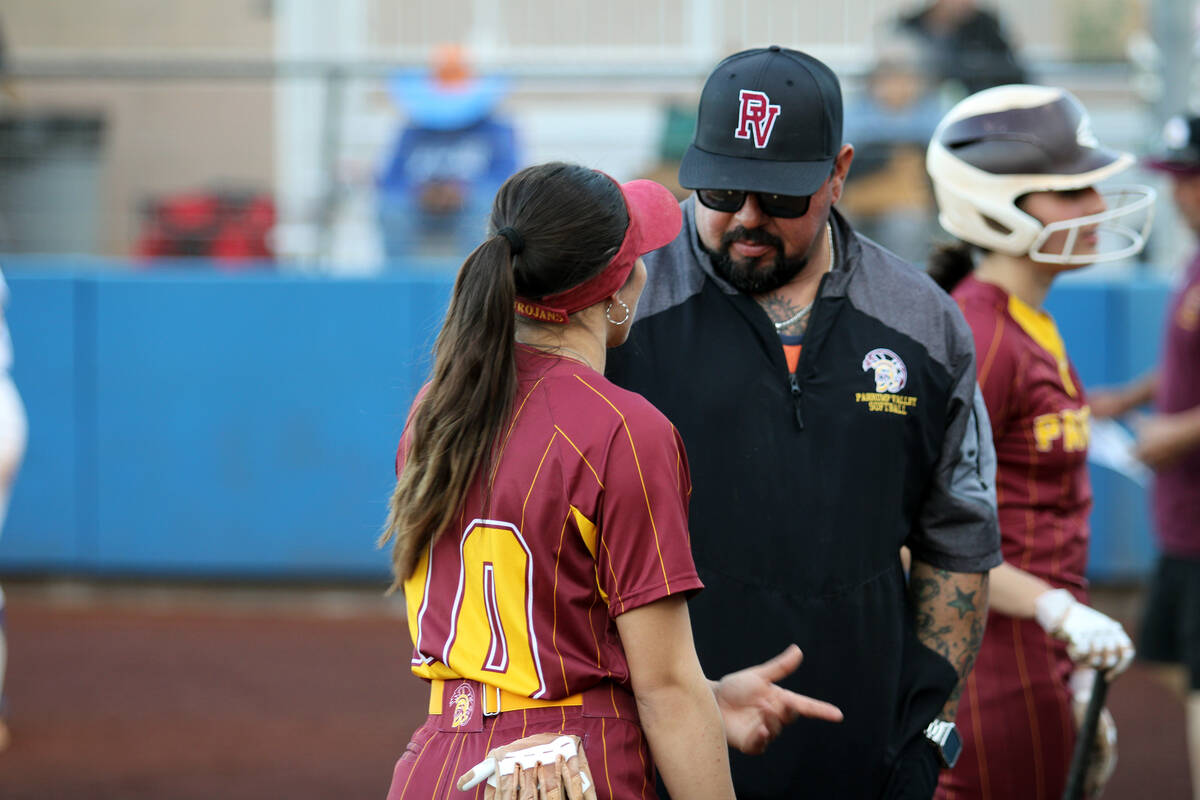 Pahrump Valley High School junior Autumn Colon talks with assistant coach Sam Charles during a ...