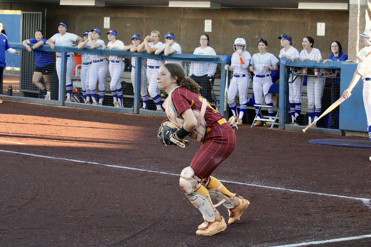 Pahrump Valley High School sophomore Mariah Gray comes off the plate to receive the ball during ...