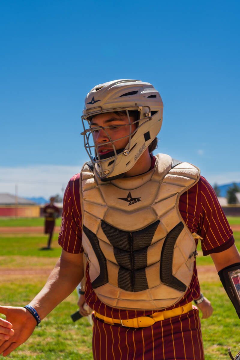 Pahrump Valley High School junior Tristan Torres gets shown some love from his teammates as he ...