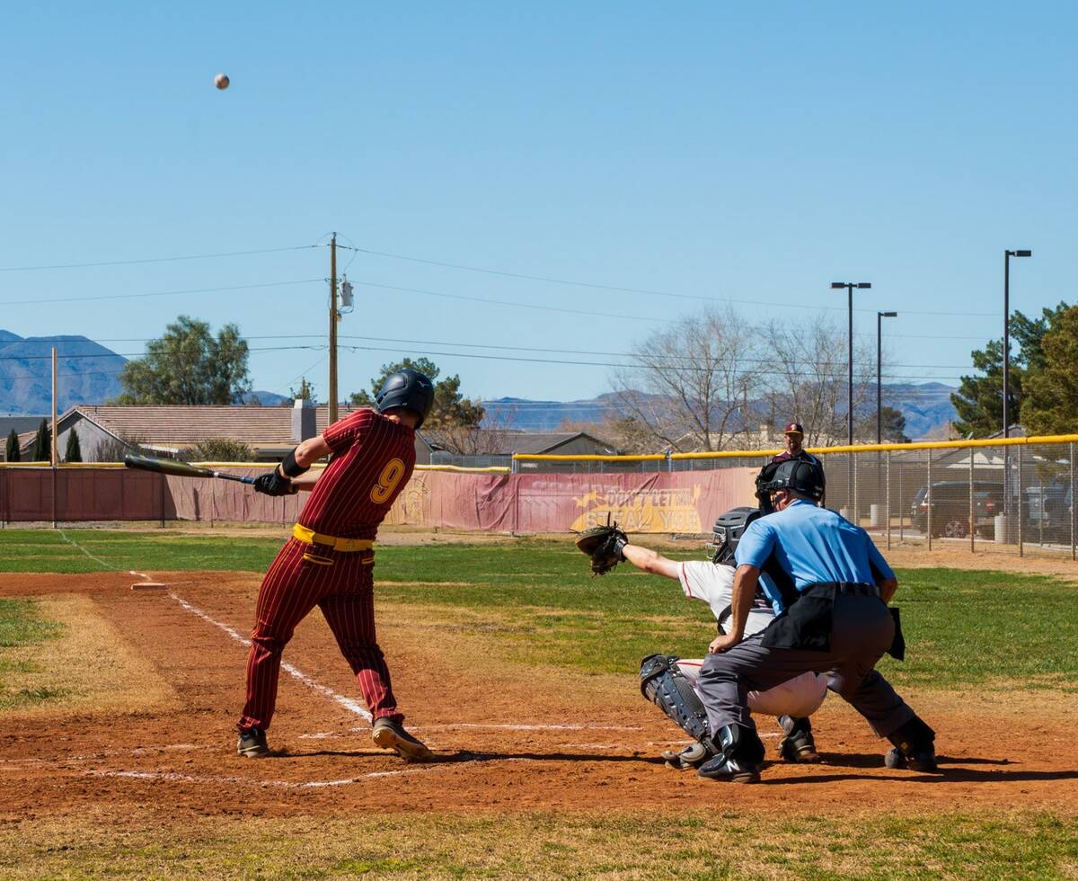 Pahrump Valley High School junior Cody Fried gets a hold of the ball sending it to right field ...