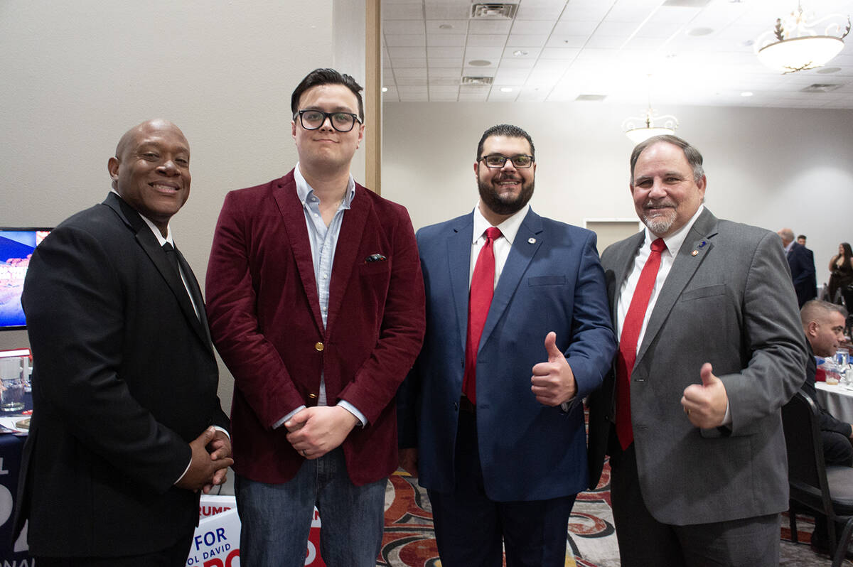 (From left to right) Armed Forces Chamber Commander Andre’ Haynes, Nevada Young Republicans C ...