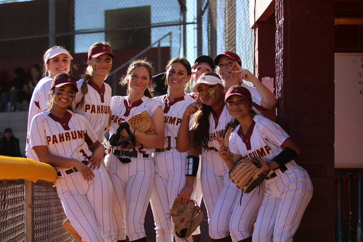 Members of the Lady Trojans varsity program show off their smiles prior to their first home gam ...