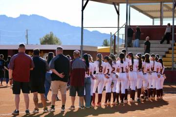 Pahrump Valley High School's 2026 varsity softball program lines up on the foul lines prior to ...