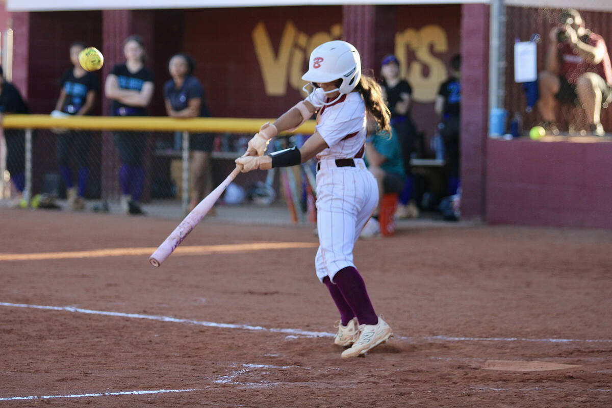 Pahrump Valley High School shortstop Aspen Middaugh comes through at the plate with an RBI in t ...