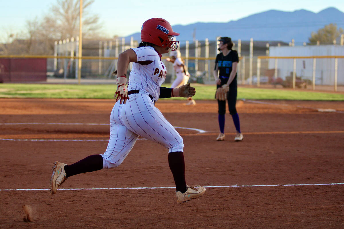 Pahrump Valley High School senior Madison Rodriguez turns on the jets to make it across home sa ...