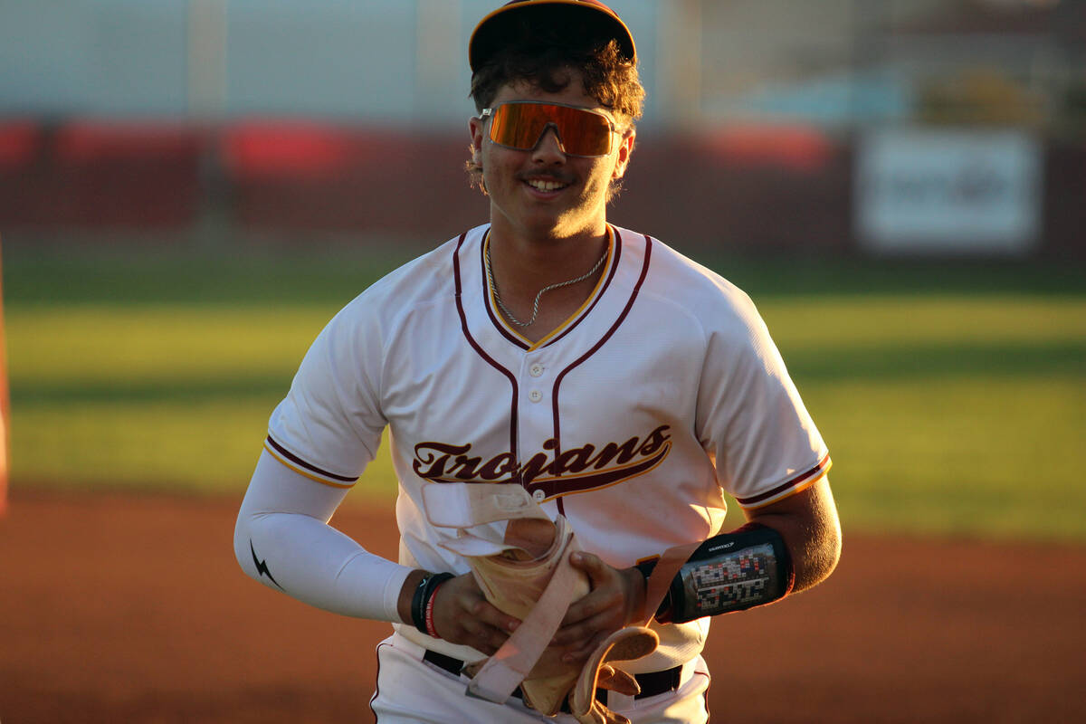 Pahrump Valley High School sophomore CJ Nelson smiles big after coming off the field during the ...