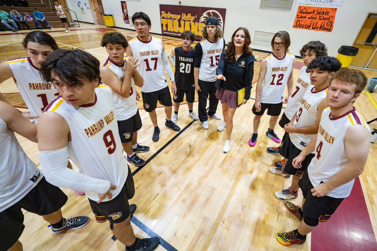 Pahrump Valley High School boys volleyball varsity head coach Amber Lugo reviews a couple of po ...