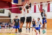 Pahrump Valley High School seniors Elijah Thompson and Alexander Mahoney pair up to stuff a kil ...