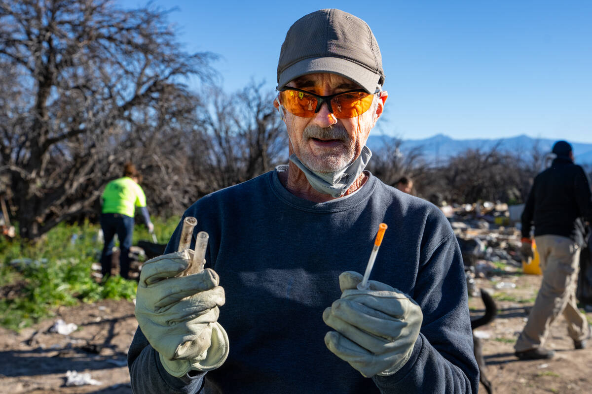Volunteer Dave Cressey, recognized for volunteering the most hours in 2025, found a used hypode ...