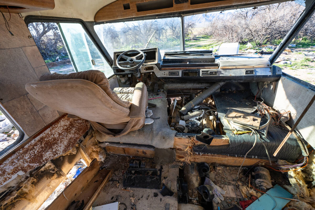 Inside the dilapidated, skeletal remains of an RV at the site (to be removed later by the BLM). ...