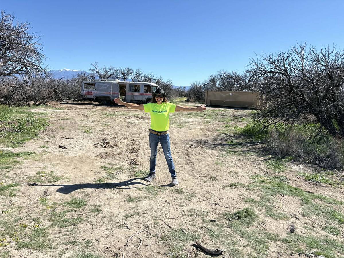 Clean Up Pahrump chapter president Faith Muello celebrates the site's final condition after vol ...