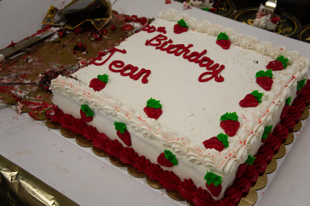 After Jean Luppo received roses from those in attendance for her 100th birthday, cake was serve ...