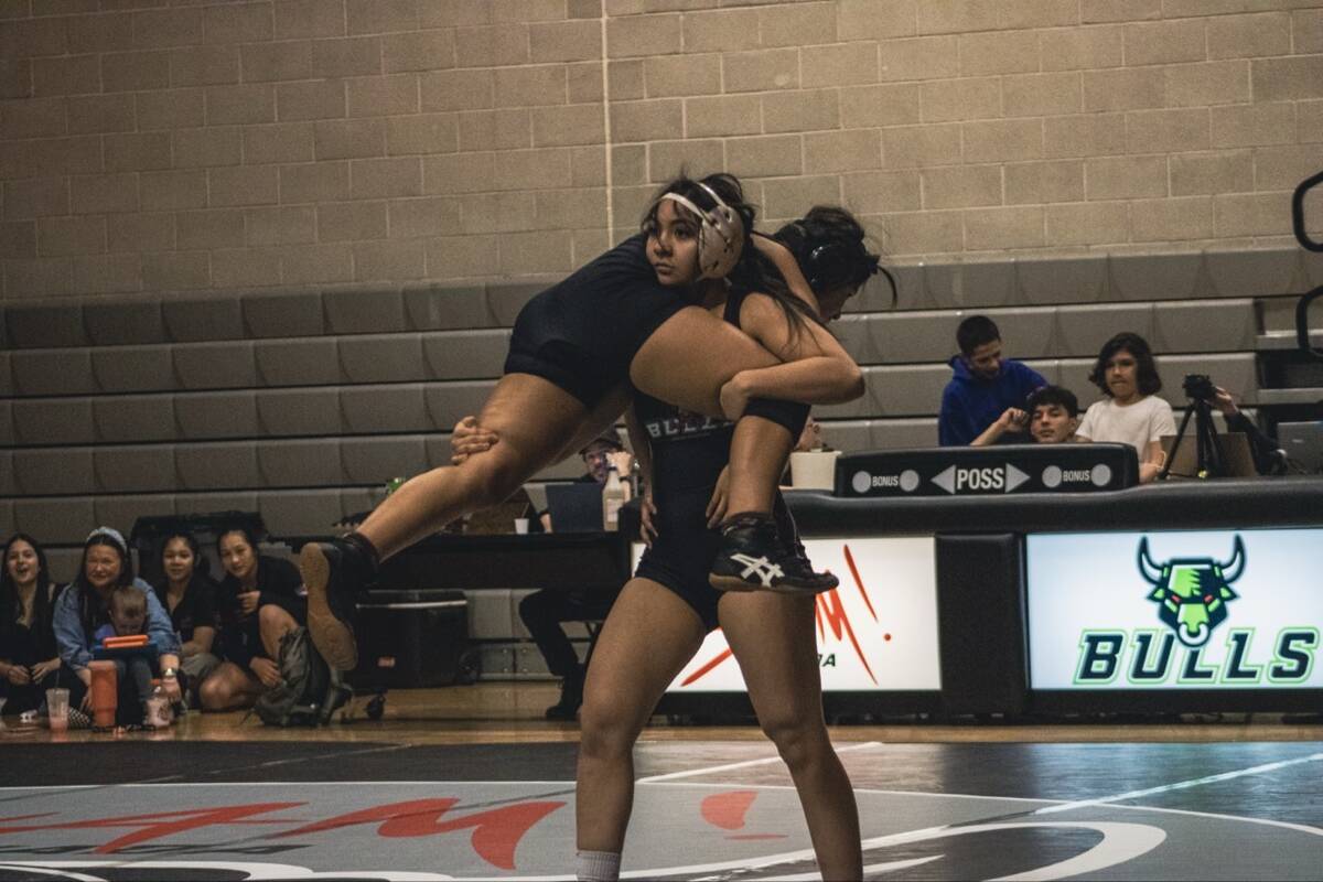 Mika Yoffee physically picks up her opponent before going for the slam during a SLAM! wrestling ...